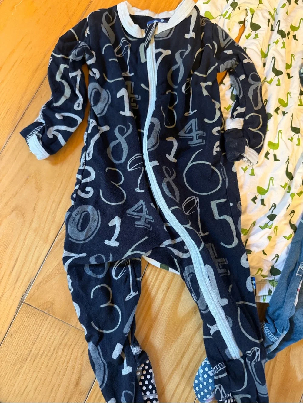 Kickee Pants Mixed Print Footed Sleepers in Blue, Green & Red